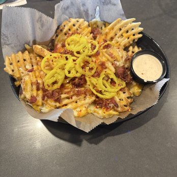 Walk-on’s - The cheese fry app, delicious! - Cajun/Creole Near Me - Cape Coral, Florida Walk-on’s - The cheese fry app, delicious! - Cajun/Creole Near Me - Cape Coral, Florida