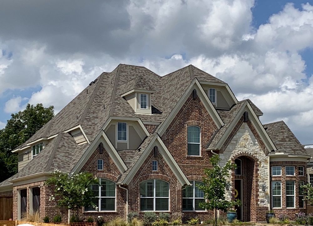 Slide of Elite Roofing and Remodel