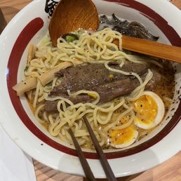 a bowl of ramen with meat and eggs a bowl of ramen with meat and eggs
