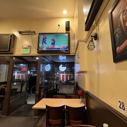 Tadka Indian Restaurant - Setup and TV showing IPL
