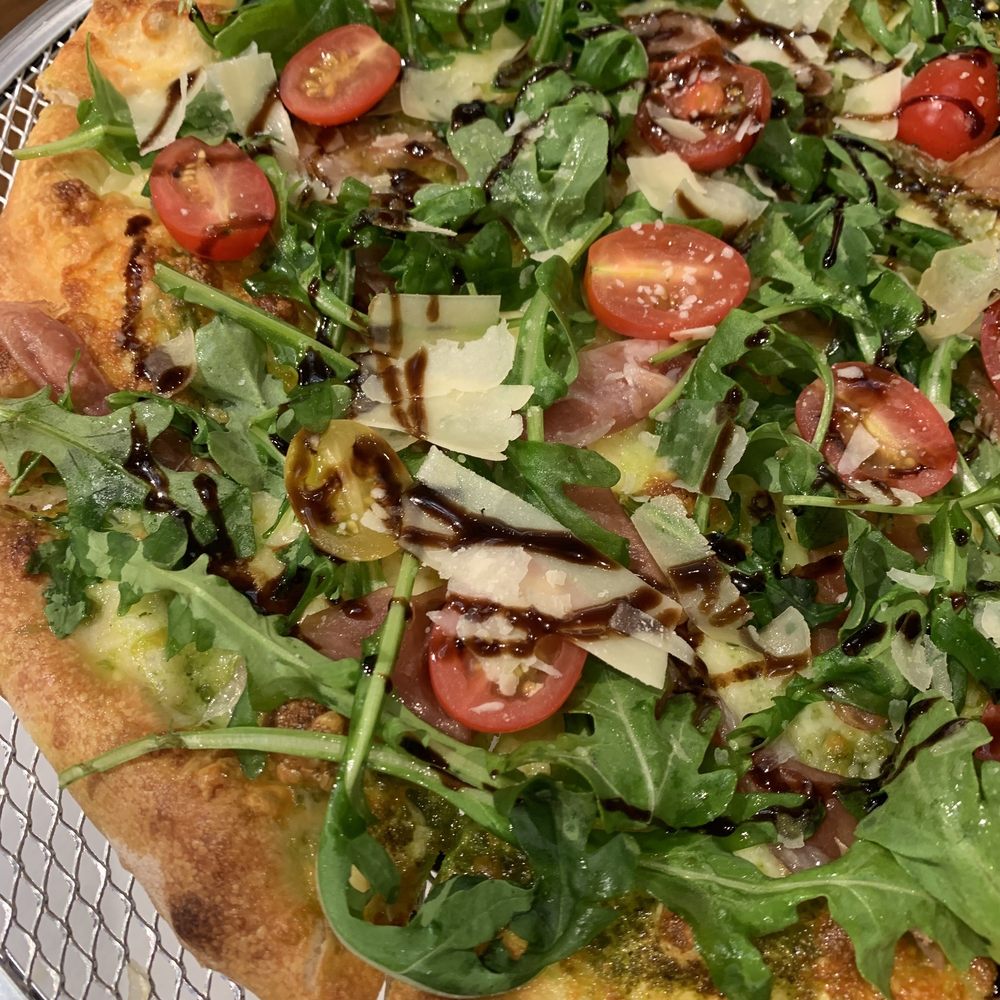 Vyne Restaurant & Bar - Arugula pizza drizzled with balsamic -- one of many trays served at open house - American Near Me - Middlebury, Connecticut Vyne Restaurant & Bar - Arugula pizza drizzled with balsamic -- one of many trays served at open house - American Near Me - Middlebury, Connecticut