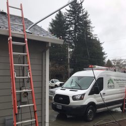 Portland Metro Electric - Electrical service mast repair, after a tree fell on the lines from a windstorm. Had the customers power back on within hours.