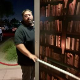 Exterior outside entrance of Barley & Smoke - Exit doors from speakeasy to parking lot disguised as bookshelves - Peoria, Arizona Exterior outside entrance of Barley & Smoke - Exit doors from speakeasy to parking lot disguised as bookshelves - Peoria, Arizona