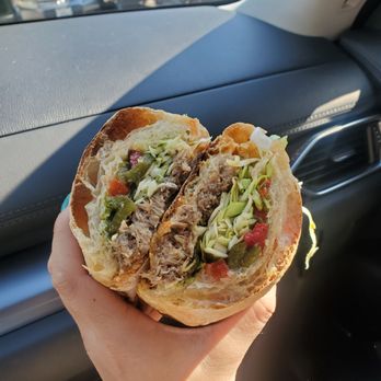 Bread Lounge - Pulled pork sandwich on ciabatta with roasted poblanos and a cilantro lime slaw. Perfection. - Bakeries Near Me - Los Angeles, California