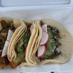 Tacos El Pollito - Al pastor (two in the left) and bistec taco (right).