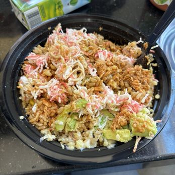 Sweet Poké - Regular bowl with brown rice, cooked salmon, crab, avocado, and tempura crunch with yum yum and eel sauce. - Poke Near Me - Las Vegas, Nevada