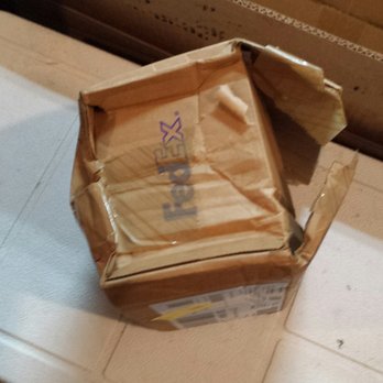 FedEx Ship Center - Box that the lady rudely said was "torn" - Shipping Centers Near Me - Albuquerque, New Mexico