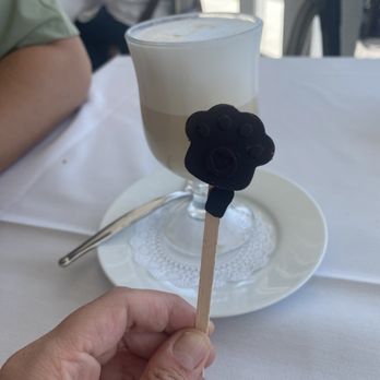 Yellow Dog Cafe - Dark chocolate (yellow) dog paw - cute touch! - Seafood Near Me - Malabar, Florida