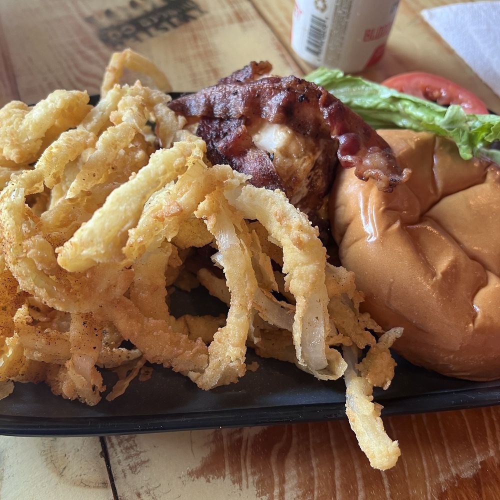 Freshman Burger with side of Onion Strings. Freshman Burger with side of Onion Strings.