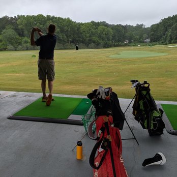 Marietta Golf Center - Inside the covered range with mats equipped with Power Tee (automatic teeing system). - Golf Near Me - Marietta, Georgia Marietta Golf Center - Inside the covered range with mats equipped with Power Tee (automatic teeing system). - Golf Near Me - Marietta, Georgia
