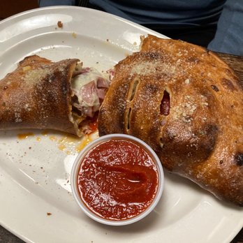 Little Sicily - Meat lovers Calzone. Delicious - Mediterranean Near Me - Beckley, West Virginia Little Sicily - Meat lovers Calzone. Delicious - Mediterranean Near Me - Beckley, West Virginia
