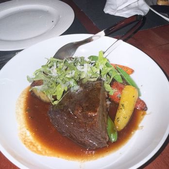 Red Door Bistro - Braised short rib - Bistros Near Me - Whistler, British Columbia Red Door Bistro - Braised short rib - Bistros Near Me - Whistler, British Columbia