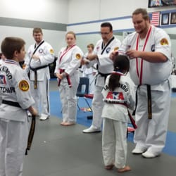 Ata Black Belt Academy - Students receiving medals after a tournament.