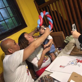 Blazing Birthdays - Fitting the birthday balloon hat for our little king! - Magicians Near Me