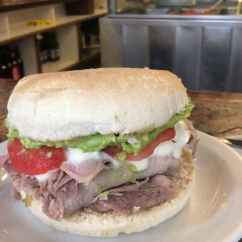Fuente Alemana - I asked for "whatever is the best" and was given this sandwich with pork, tomatoes, avocado, and home made mayo. - Sandwiches Near Me - Santiago, RM