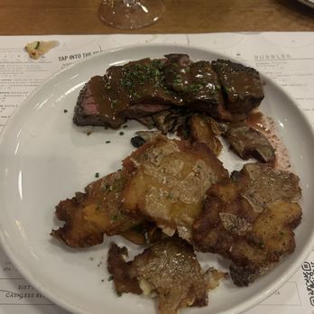 Sixty Vines - WOOD GRILLED BAVETTE STEAK* mushroom shallot confit, crispy fingerling potatoes, chives, foie gras-zinfandel demi - New American Near Me - Dallas, Texas Sixty Vines - WOOD GRILLED BAVETTE STEAK* mushroom shallot confit, crispy fingerling potatoes, chives, foie gras-zinfandel demi - New American Near Me - Dallas, Texas