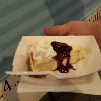 Sweet Whimsies - Cheesecake; creamy cheesecake on a graham crust, topped with a triple berry sauce and whipped cream - Food Trucks Near Me