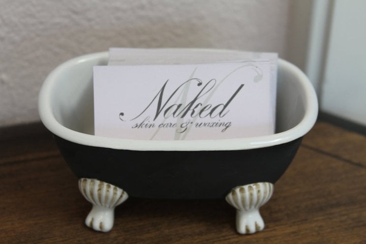 Naked Skin Care & Waxing Logo