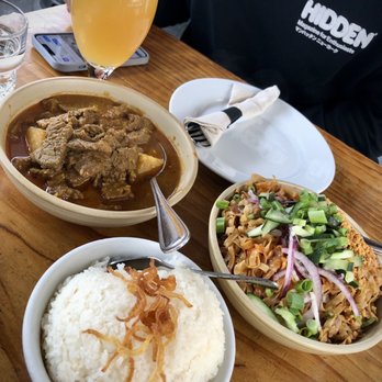 Burma Superstar - Burmese Style Beef (left), Garlic noodles with pork belly (right), Coconut rice, Burmese Cooler - Burmese Near Me - Alameda, California Burma Superstar - Burmese Style Beef (left), Garlic noodles with pork belly (right), Coconut rice, Burmese Cooler - Burmese Near Me - Alameda, California