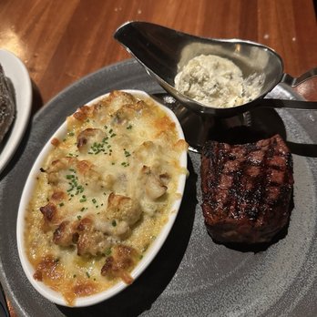 J. Gilbert's Wood-Fired Steaks & Seafood - Steak with side of cauliflower - Steakhouses Near Me - Overland Park, Kansas J. Gilbert's Wood-Fired Steaks & Seafood - Steak with side of cauliflower - Steakhouses Near Me - Overland Park, Kansas