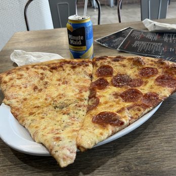 Pasquales Pizzeria - Two NY style (and size) slices - Italian Near Me - Alafaya, Florida