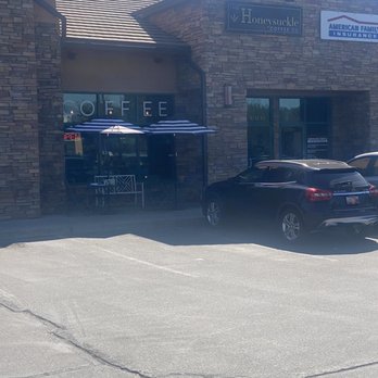 The Honeysuckle Coffee Co - Front entrance tucked away. Look for the tables with umbrellas out front. - Coffee & Tea Near Me - Sandy, Utah The Honeysuckle Coffee Co - Front entrance tucked away. Look for the tables with umbrellas out front. - Coffee & Tea Near Me - Sandy, Utah