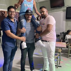 Magic 8 Sports Bar - One of the owners, my son, a friend and my self.