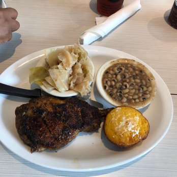 Soul Fish Cafe - Smoked Pork Chop w/ Black Eyed Peas & Cajun Cabbage. - Southern Near Me - Memphis, Tennessee Soul Fish Cafe - Smoked Pork Chop w/ Black Eyed Peas & Cajun Cabbage. - Southern Near Me - Memphis, Tennessee