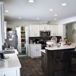IVO Cabinets & Surfaces - Calacatta Verona Quartz Countertops & glass tile backsplash