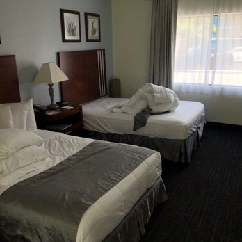 The Beachcomber - A typical room with 2 full beds. - Hotels Near Me - St. Pete Beach, Florida