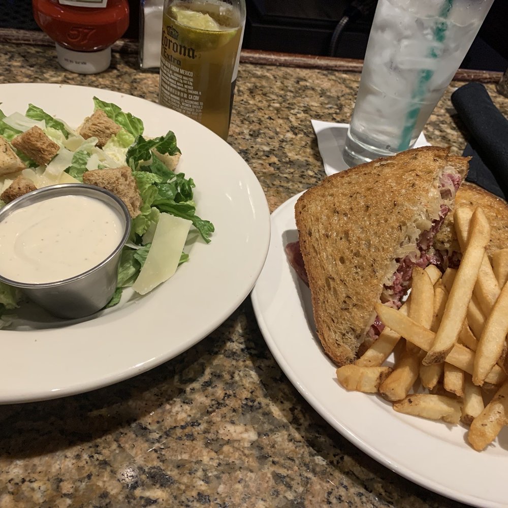 The Orioles Grille - Caesar salad and Reuben sandwich with fries and a pickle. - Food Near Me - Baltimore, Maryland The Orioles Grille - Caesar salad and Reuben sandwich with fries and a pickle. - Food Near Me - Baltimore, Maryland