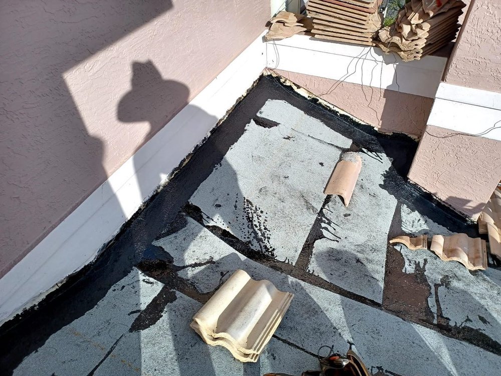 Slide of Guaranteed Roofing Solutions