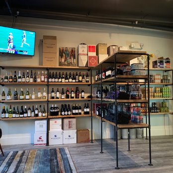 Hop & Vine - Beer/wine wall for purchase to take away or stay... - Wine Bars Near Me - Davidson, North Carolina