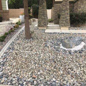 GJ & M Landscaping INC - Front and Side view.  The divider was added as part of the project.  The outer edge of the driveway has a matching divider. - Landscaping Near Me - Fullerton, California