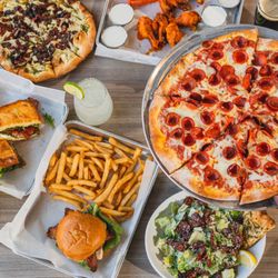 FlyteCo Tower - Pepperoni Pizza, Chicken Wings tossed in buffalo sauce, Caesar Salad, Chicken Club with fries, BLT with Beer Cheese Soup, Herb Pesto Pizza
