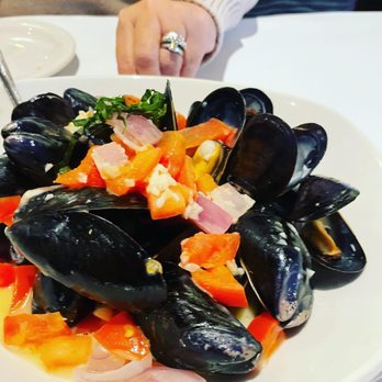 Bonefish Grill - Mussel appetizer with diced tomatoes and onion. - Seafood Near Me - Troy, Michigan