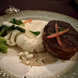 Black and Blue Filet over creamy Gorgonzola and Roasted Garlic Mashed Potatoes. Black and Blue Filet over creamy Gorgonzola and Roasted Garlic Mashed Potatoes.