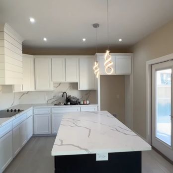 Esperto Builders - a kitchen with a large island - General Contractors Near Me - San Jose, California Esperto Builders - a kitchen with a large island - General Contractors Near Me - San Jose, California