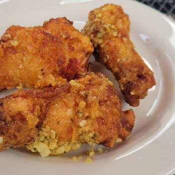 Group Therapy Bar And Grill - Garlic chicken wings - Sports Bars Near Me - Renton, Washington Group Therapy Bar And Grill - Garlic chicken wings - Sports Bars Near Me - Renton, Washington