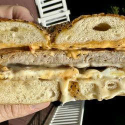 Seed Central Coffee & Eats - Sausage, egg & cheese with Calabrian Mayo on Cheddar Everything