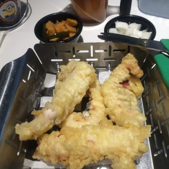 Dan Moo Ji - 4 piece fried squid. I thought the batter was too heavy but the squid was tender. - Korean Near Me - Duluth, Georgia Dan Moo Ji - 4 piece fried squid. I thought the batter was too heavy but the squid was tender. - Korean Near Me - Duluth, Georgia