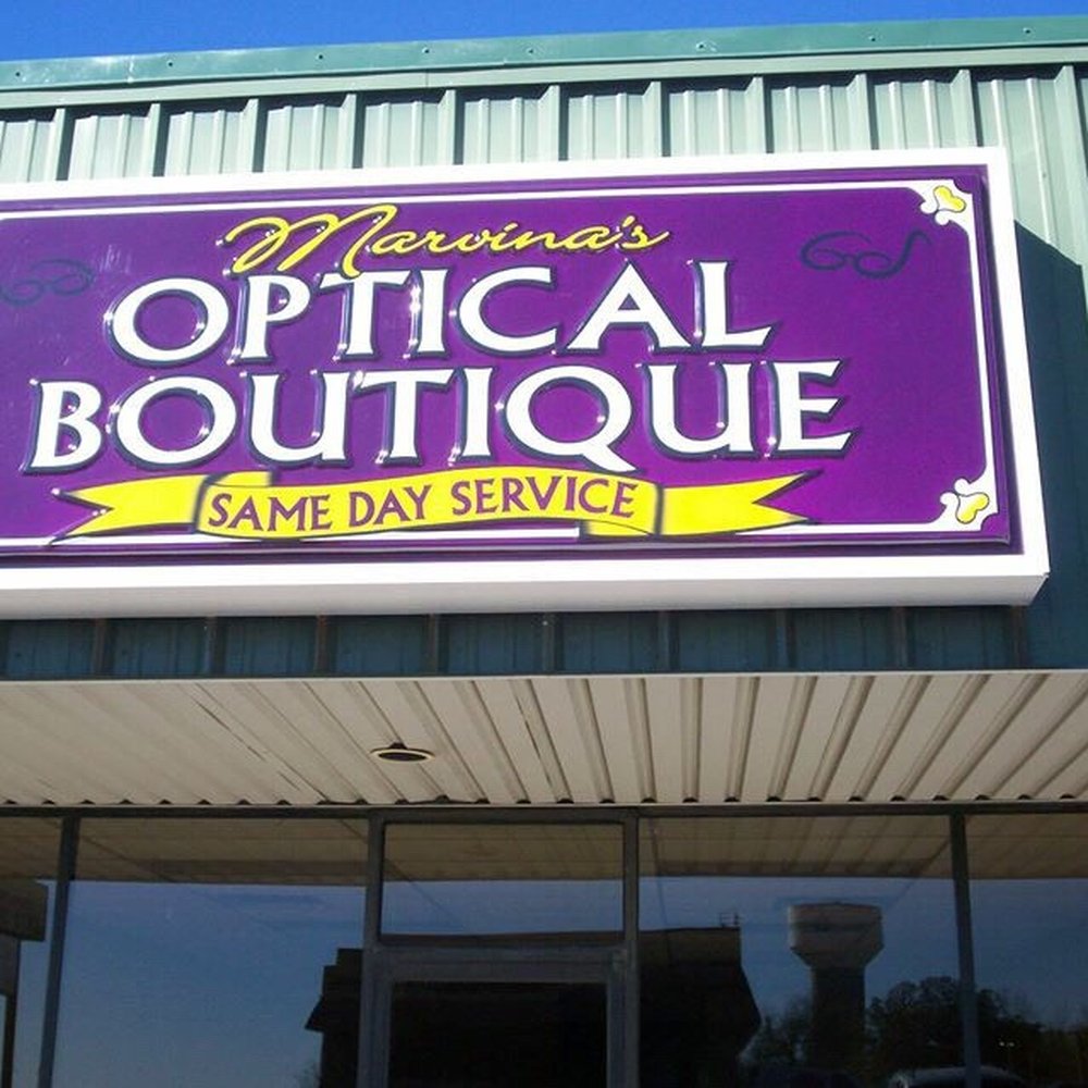 Marvina's Optical Boutique - Her sign is purple like her entire store!! - Eyewear & Opticians Near Me - Cameron, Texas Marvina's Optical Boutique - Her sign is purple like her entire store!! - Eyewear & Opticians Near Me - Cameron, Texas