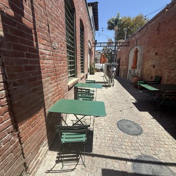 Pinyon - Seating outside. Chairs are a little uncomfortable. - Bakeries Near Me - Ventura, California