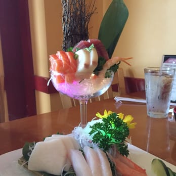 Sake House 2 - A sashimi cocktail! Nice presentation of their Sashimi Deluxe. - Sushi Bars Near Me - Jacksonville, Florida Sake House 2 - A sashimi cocktail! Nice presentation of their Sashimi Deluxe. - Sushi Bars Near Me - Jacksonville, Florida