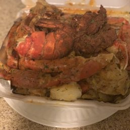 Super seafood platter with garlic butter seasoning Super seafood platter with garlic butter seasoning