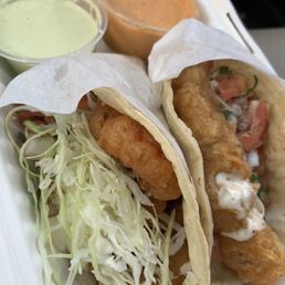 Fish and shrimp tacos. Don't sleep on those sauces. Fish and shrimp tacos. Don't sleep on those sauces.