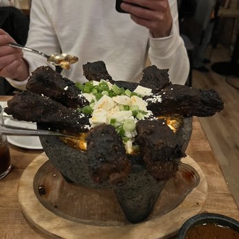 Ni Tuyo - Morisqueta Molcajete (pork ribs) - Tacos Near Me - Denver, Colorado Ni Tuyo - Morisqueta Molcajete (pork ribs) - Tacos Near Me - Denver, Colorado