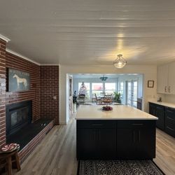 Carpet Weavers - 48x24 tile on hearth top to blend new finishes room to room