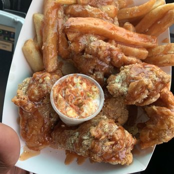 Marlon's Chicken - Four wings, lemon pepper and mild sauce. - Chicken Shop Near Me - Chicago, Illinois
