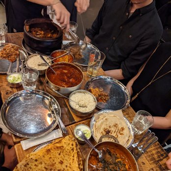 Dhamaka - Rajasthani khargosh (whole rabbit) with sides and breads - Indian Near Me - New York, New York